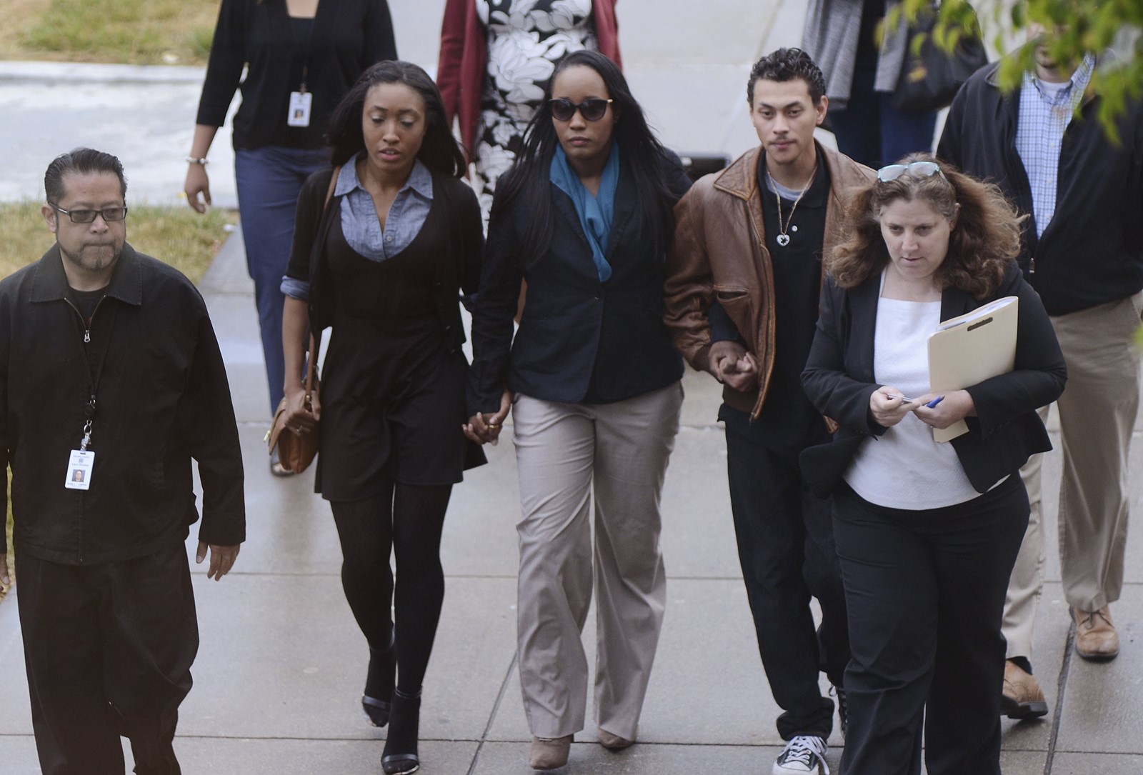 INA ROGERS, center, walks to Solano County Superior Court, where she was  taken into custody Wednesday. (Robinson Kuntz Daily Republic)
