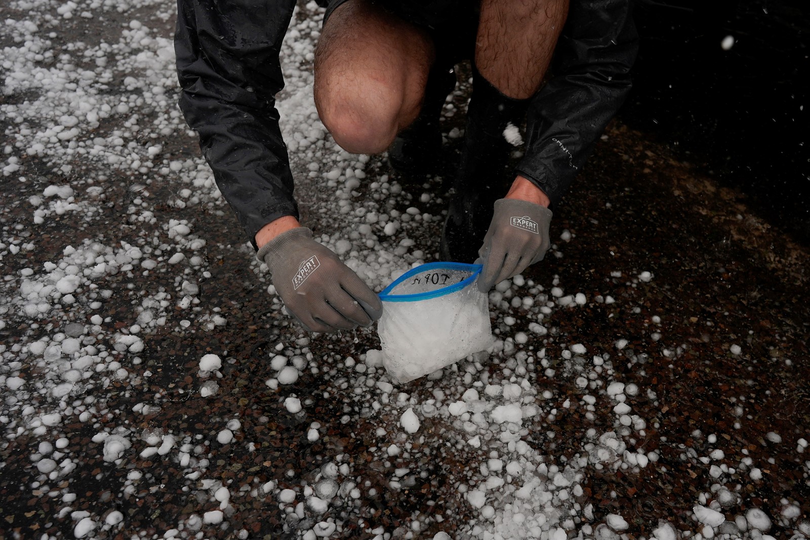 Climate_Chasing_Hail_Collecting_51331--bb905_1094591151.jpg